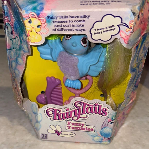 Hasbro Other - Hasbro Fairy Tails Fuzzy Tummies Blue and Yellow Toy